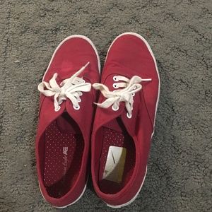 Gently used red sneakers